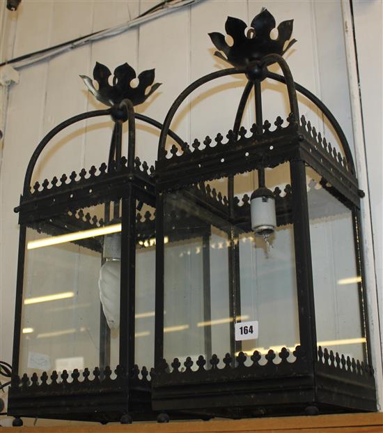 Pair of black painted lanterns